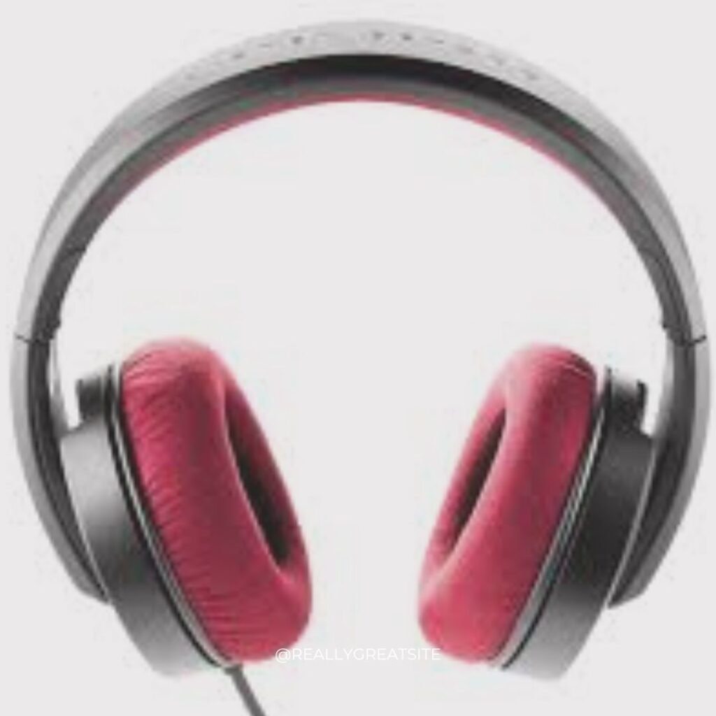 Focal Listen Professional headphones on amp head – high-end headphones for guitar amp clarity.