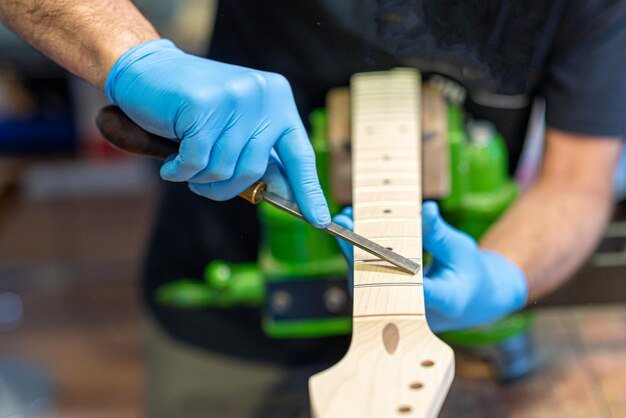 Use a String Cleaner or Lubricant  Clean Guitar Strings 